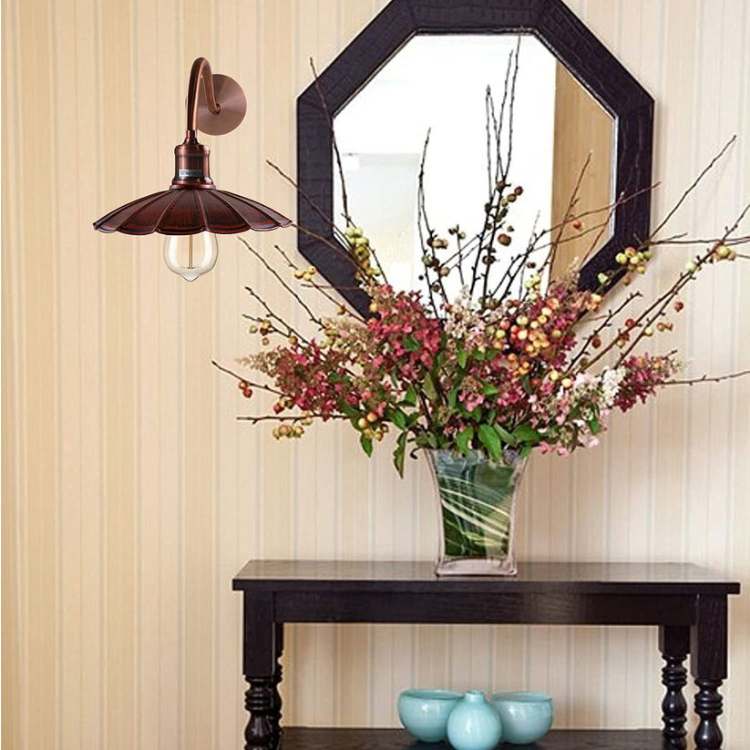 A pair of swing-arm wall sconces with plug-in cords