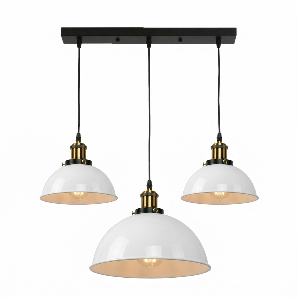 Three pendant lights with white shades and brass fixtures